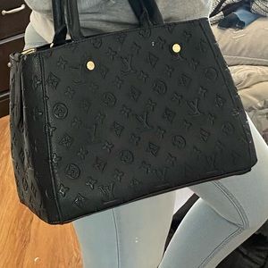 Black and gold PVC leather bag.New ready to sell.